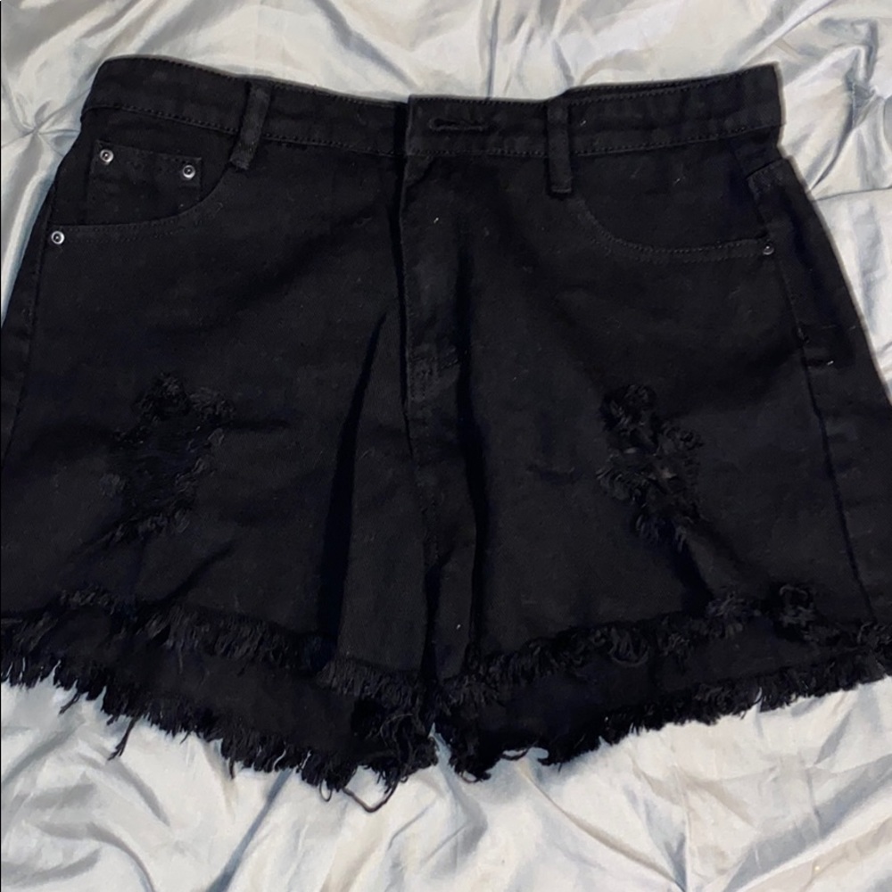 Black distressed shorts